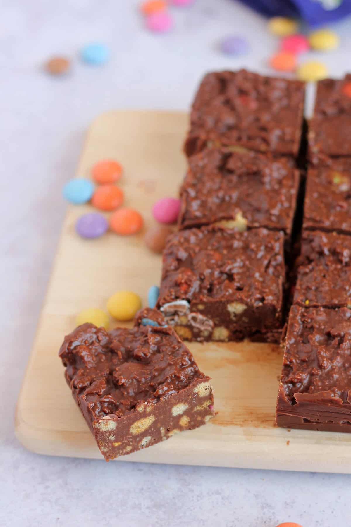 A close up picture of the biscuit cake, showing the chocolate, biscuit and candy layers.