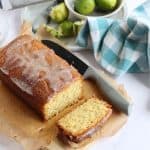 A slice of lime and coconut loaf cake