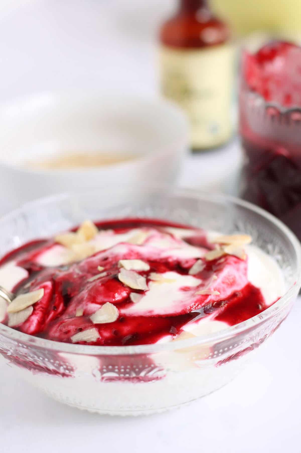 Bowl of yogurt and fruit coulis