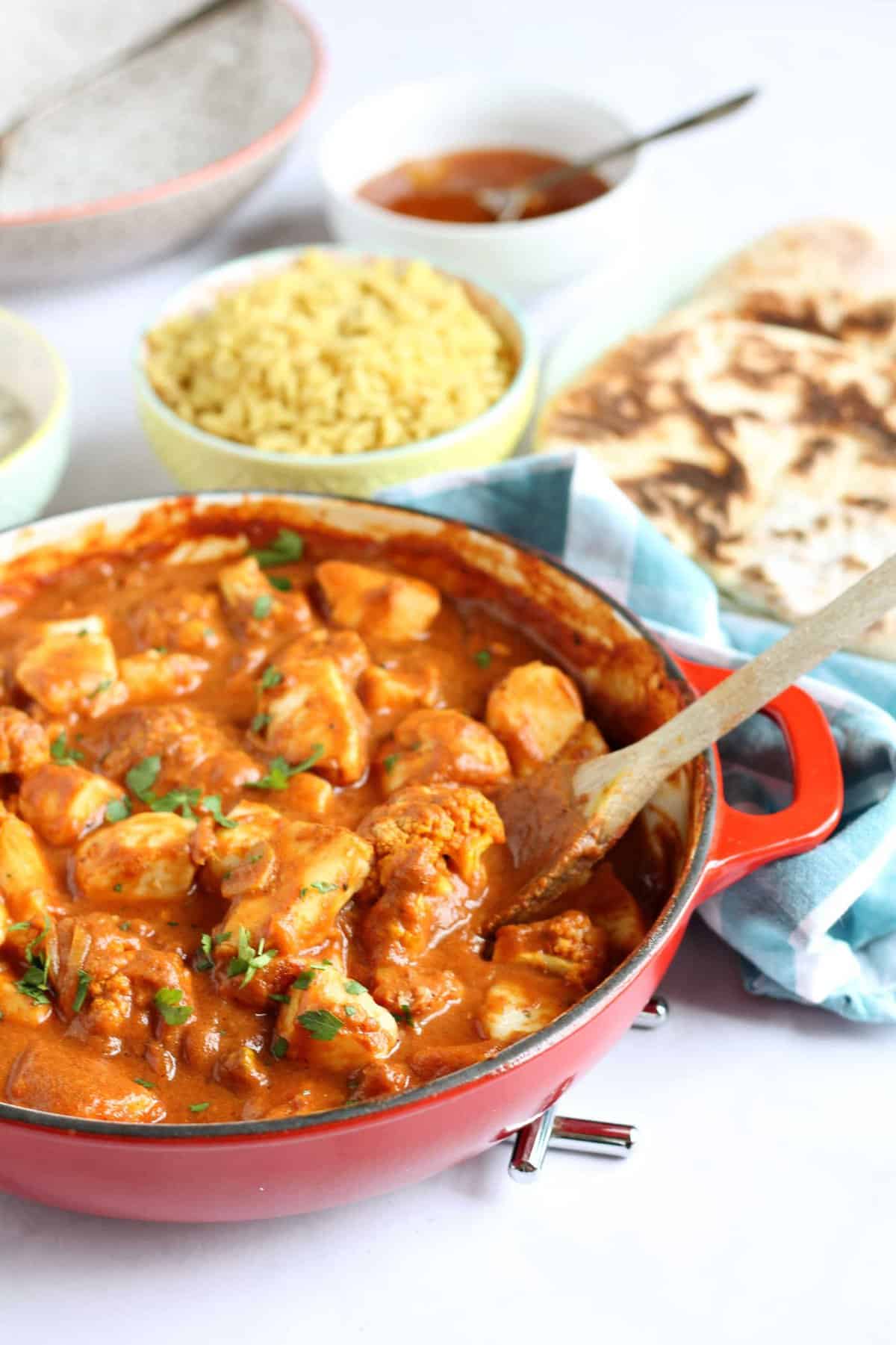 A pan of halloumi and cauliflower curry.