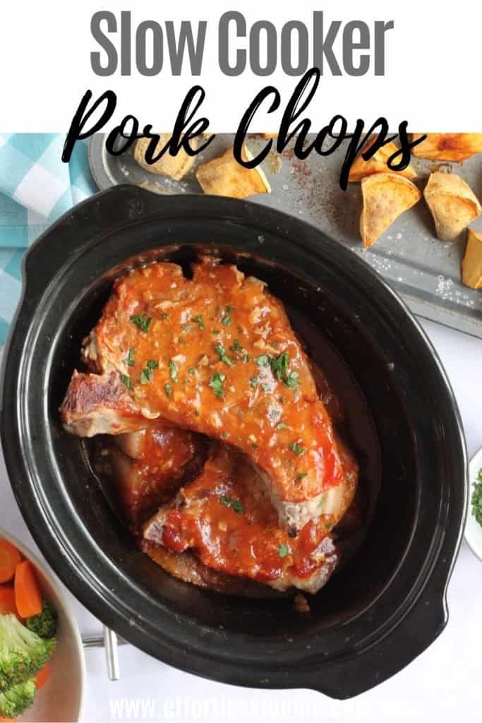 Slow cooker pork chops in a slow cooker basin.