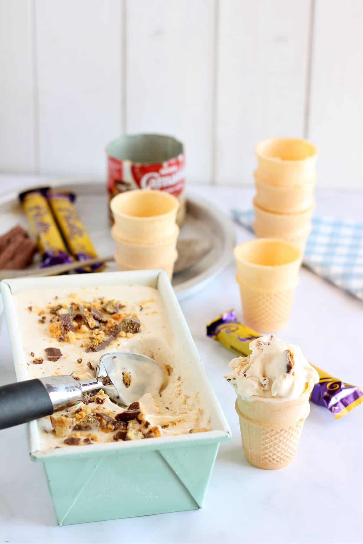 Homemade no churn honeycomb ice cream served in a waffle cone.