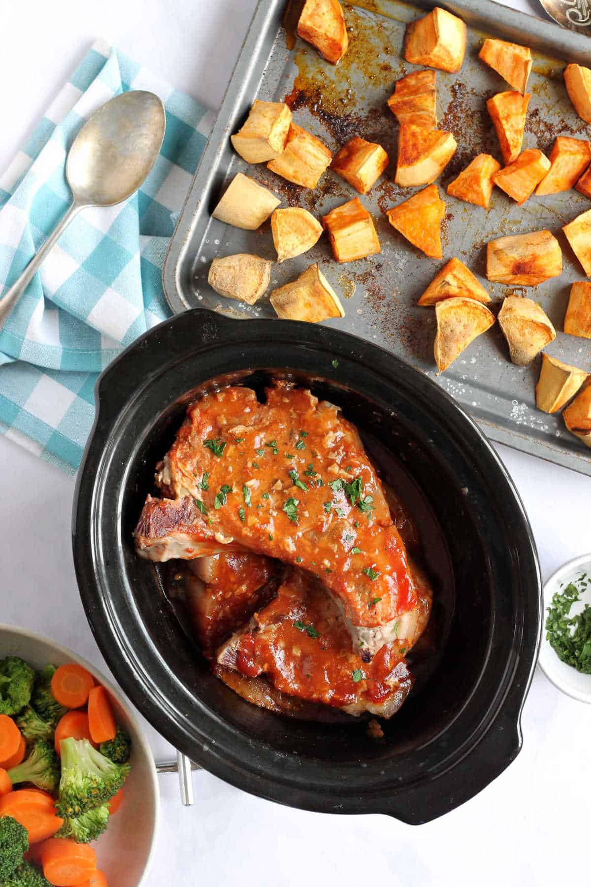 Overhead image of pork chops in a slow cooker