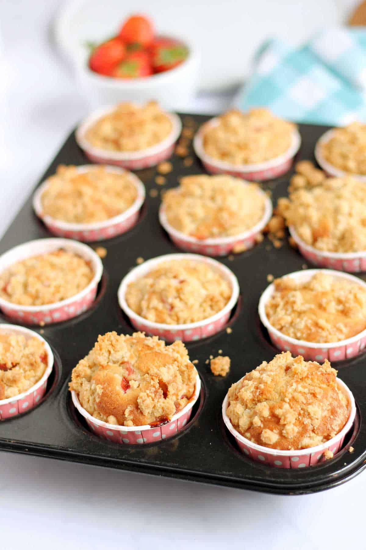 Muffins in a muffin tin, just out of the oven.