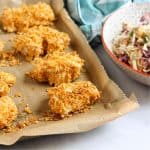 cornflake chicken nuggets on baking tray