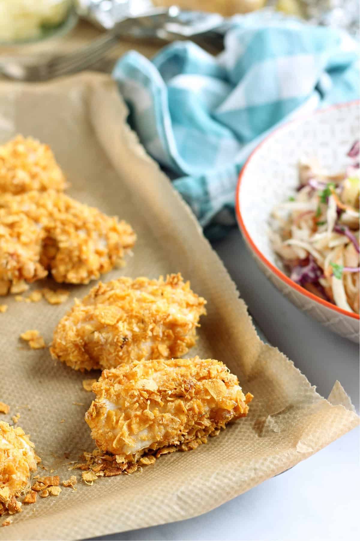 Homemade nuggets with apple slaw