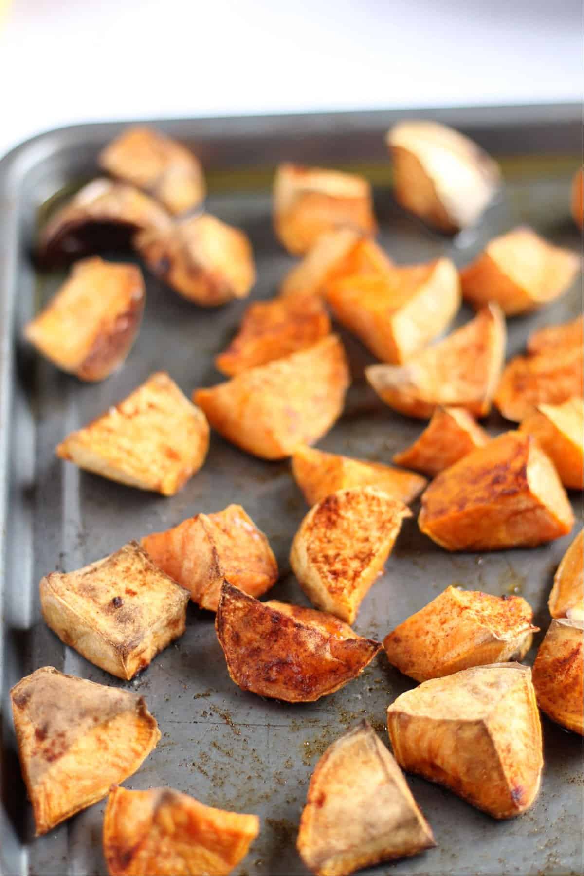 A tray of roast sweet potato chunks