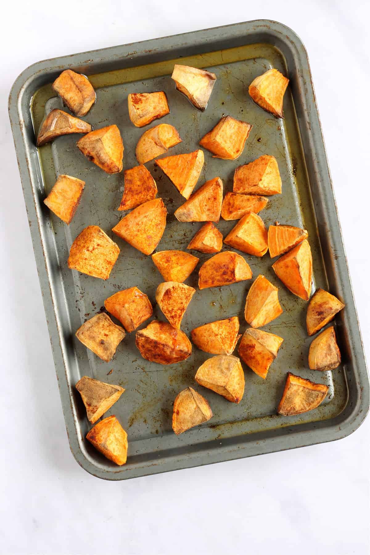 Overhead shot of roast sweet potatoes with smoked paprika