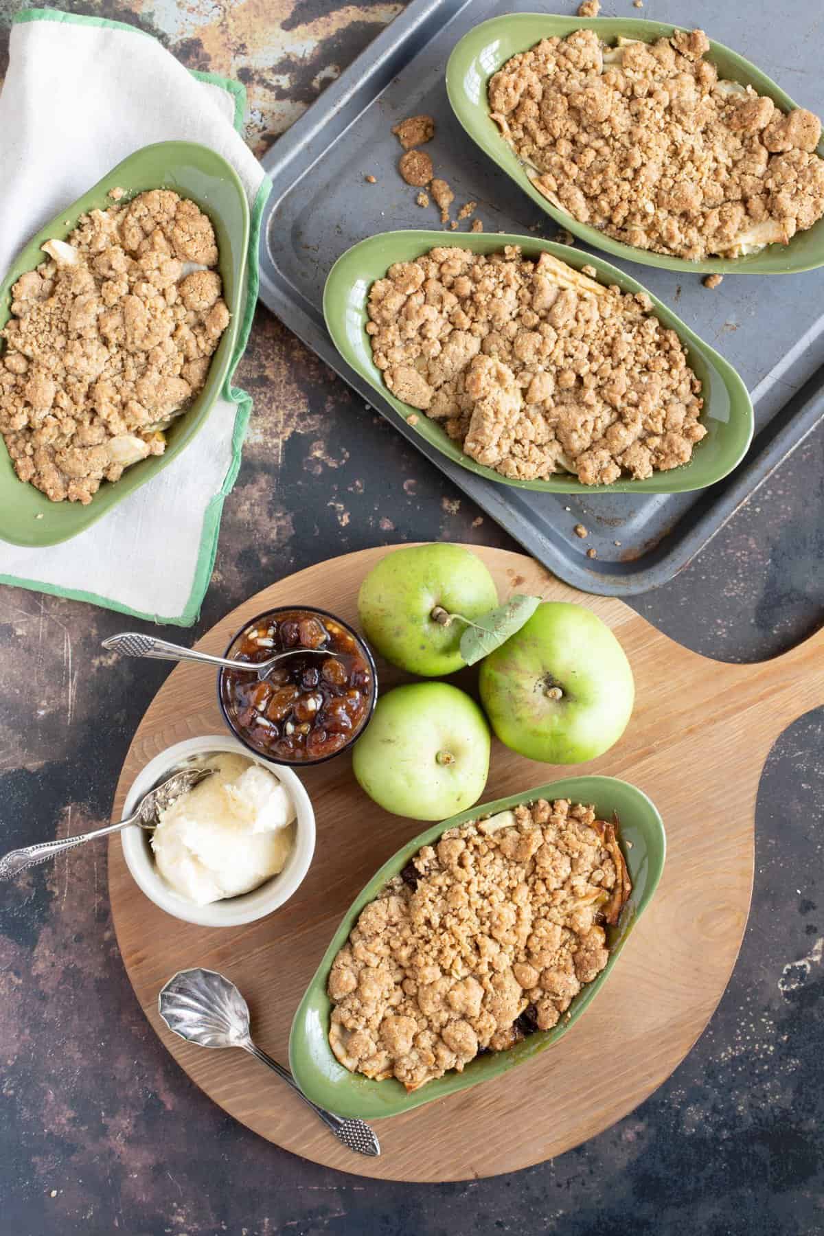 Overhead shot of apple and mincemeat crumble with a jar of mincemeat.