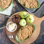 overhead shot of mincemeat and apple crumble with clotted cream.