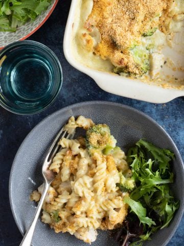 A bowl of chicken broccoli pasta bake.