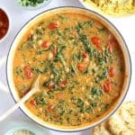 Chickpea and spinach curry in a pan.