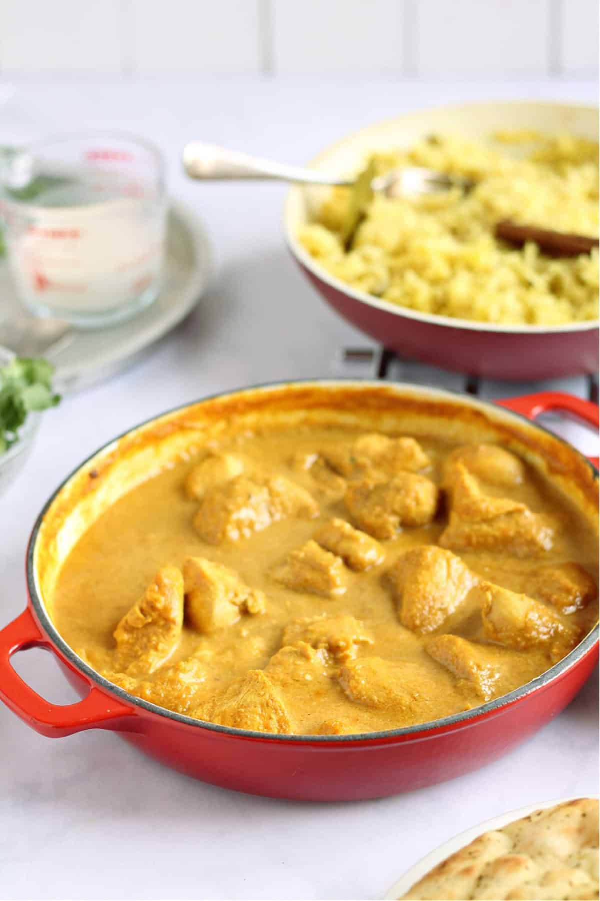 Mild chicken curry and homemade pilau rice ready to serve.