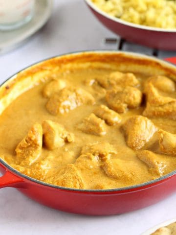 A pan of mild chicken curry.