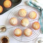 Overhead shot of mincemeat muffins on a wire rack.