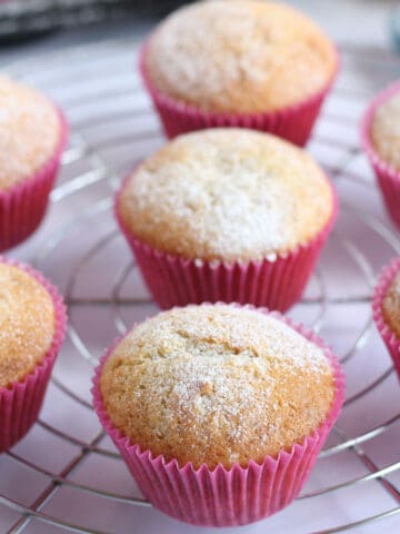 Mincemeat muffins on a wire rack.