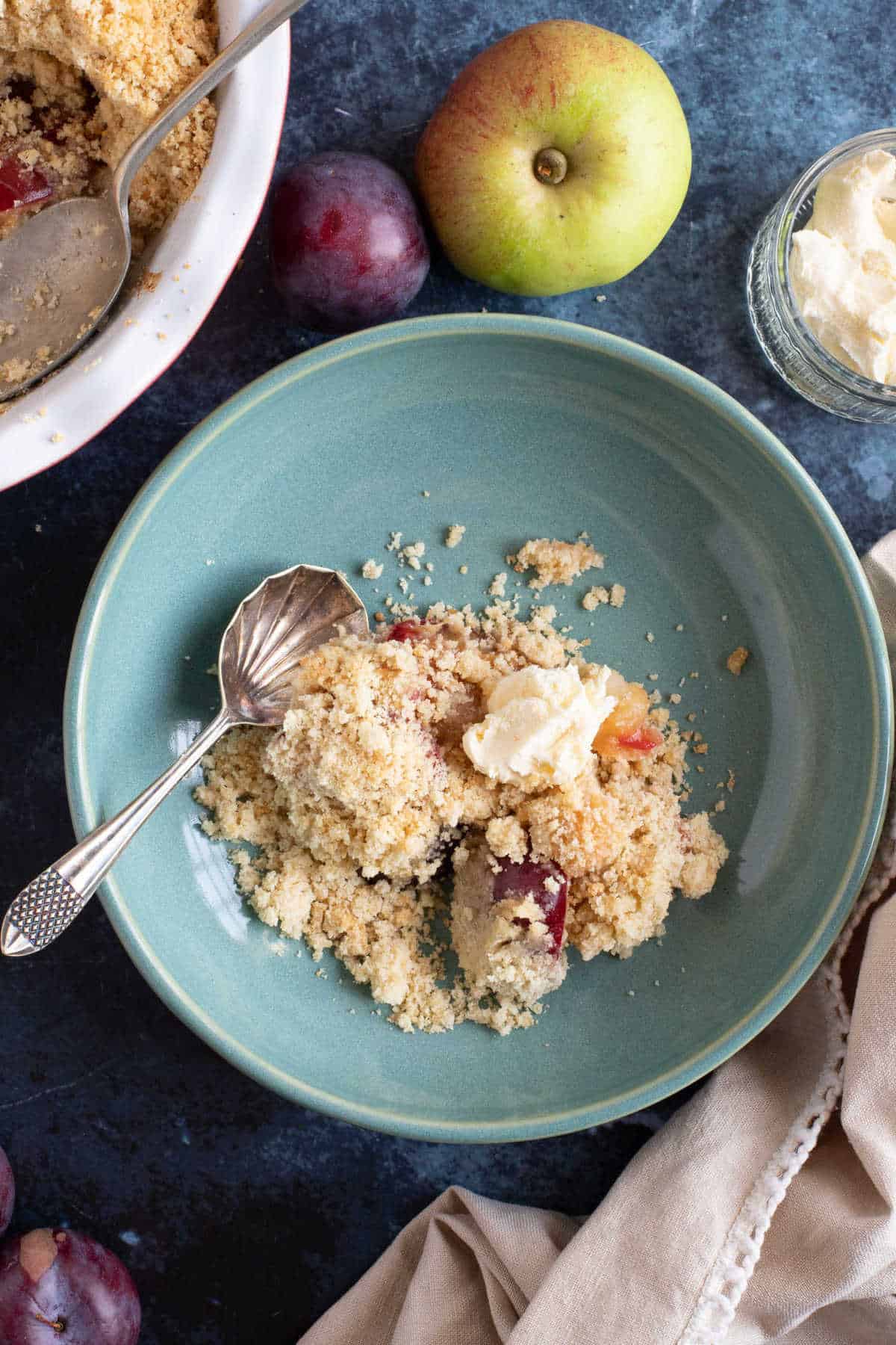 Plum crumble with clotted cream