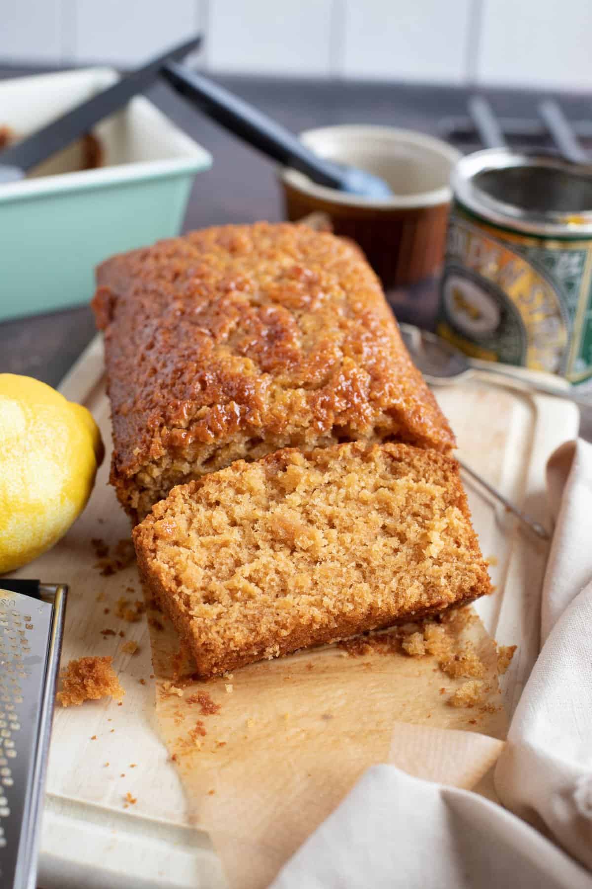 A slice of golden syrup and lemon loaf cake.