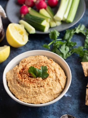 Homemade Moroccan hummus is a bowl.