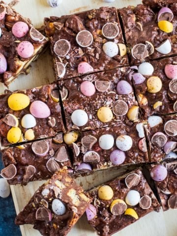 Chocolate mini egg tiffin cut into squares.