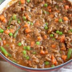 Savoury mince in a red pan.