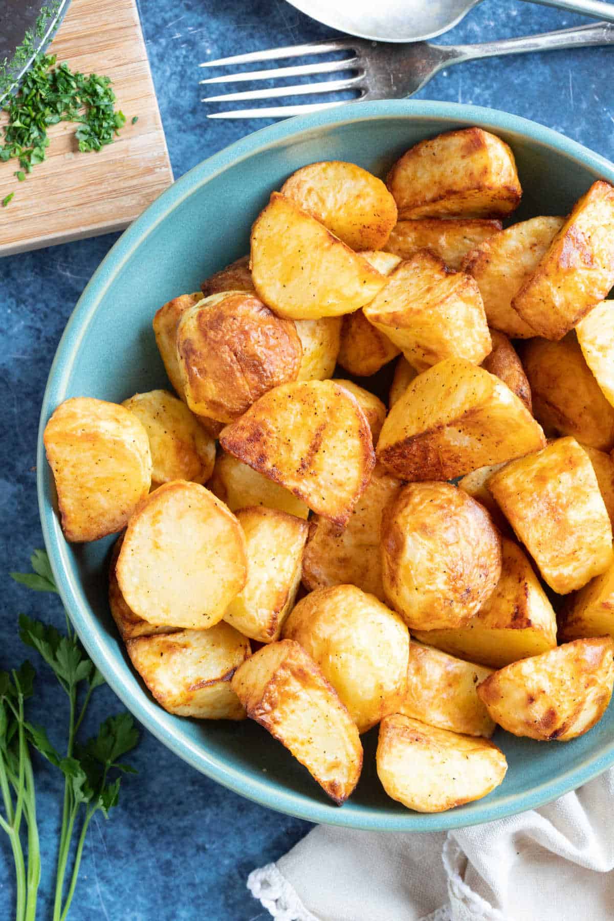 Roast potatoes in a serving bowl.