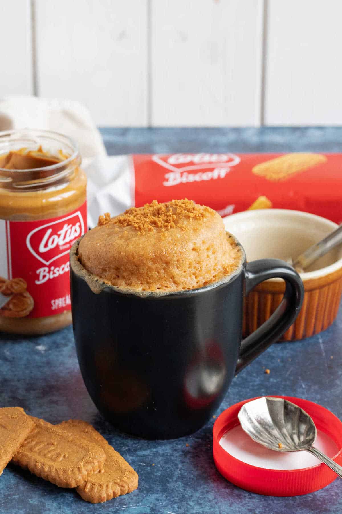 Mug cake with biscoff spread jar.