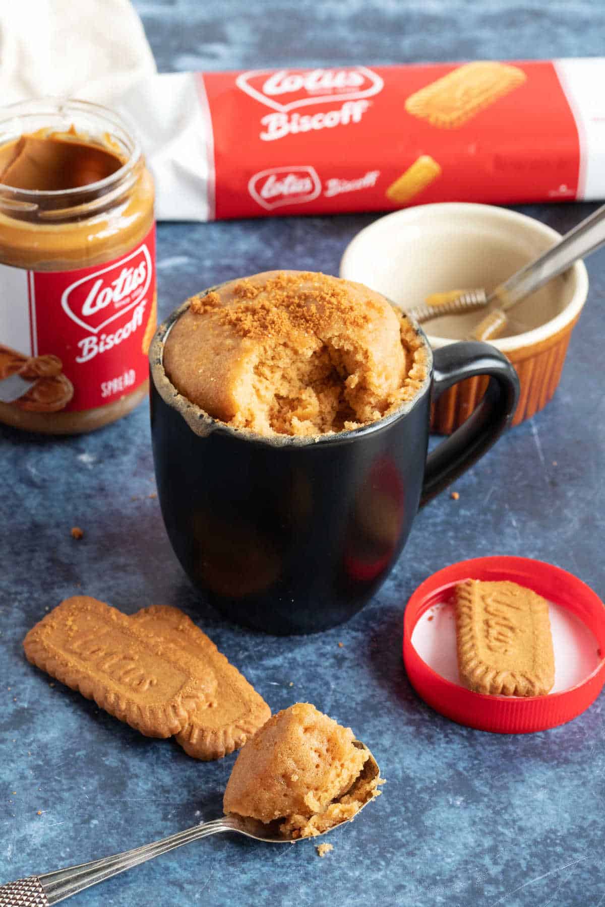 Biscoff mug cake in a black mug.