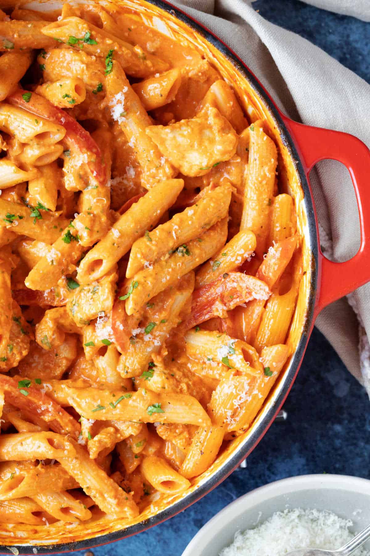 Cajun chicken pasta is a red pan.