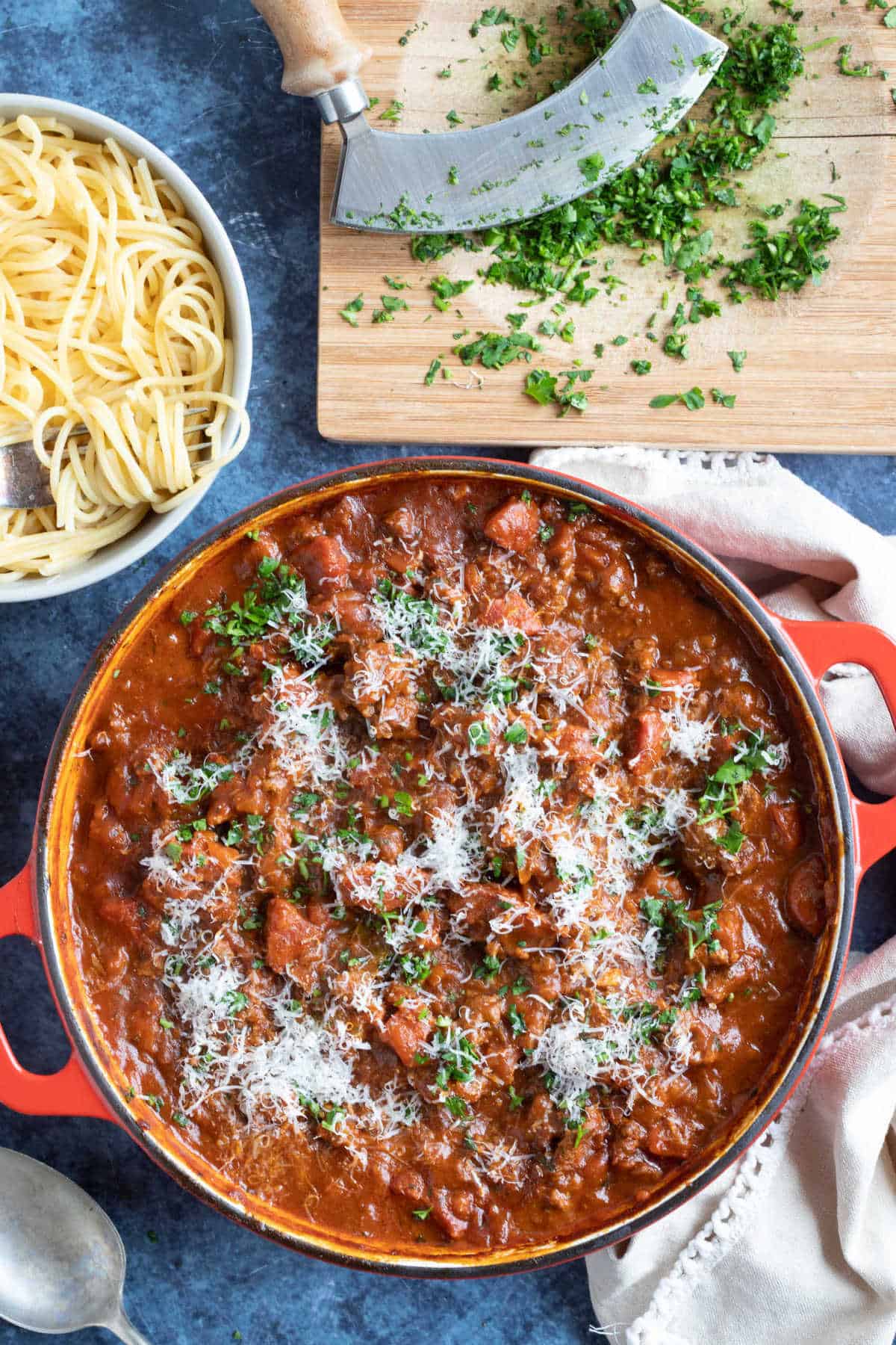 A pan of smoky chorizo bolognese with spaghetti.