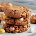 A stack of chocolate mini egg cookies.