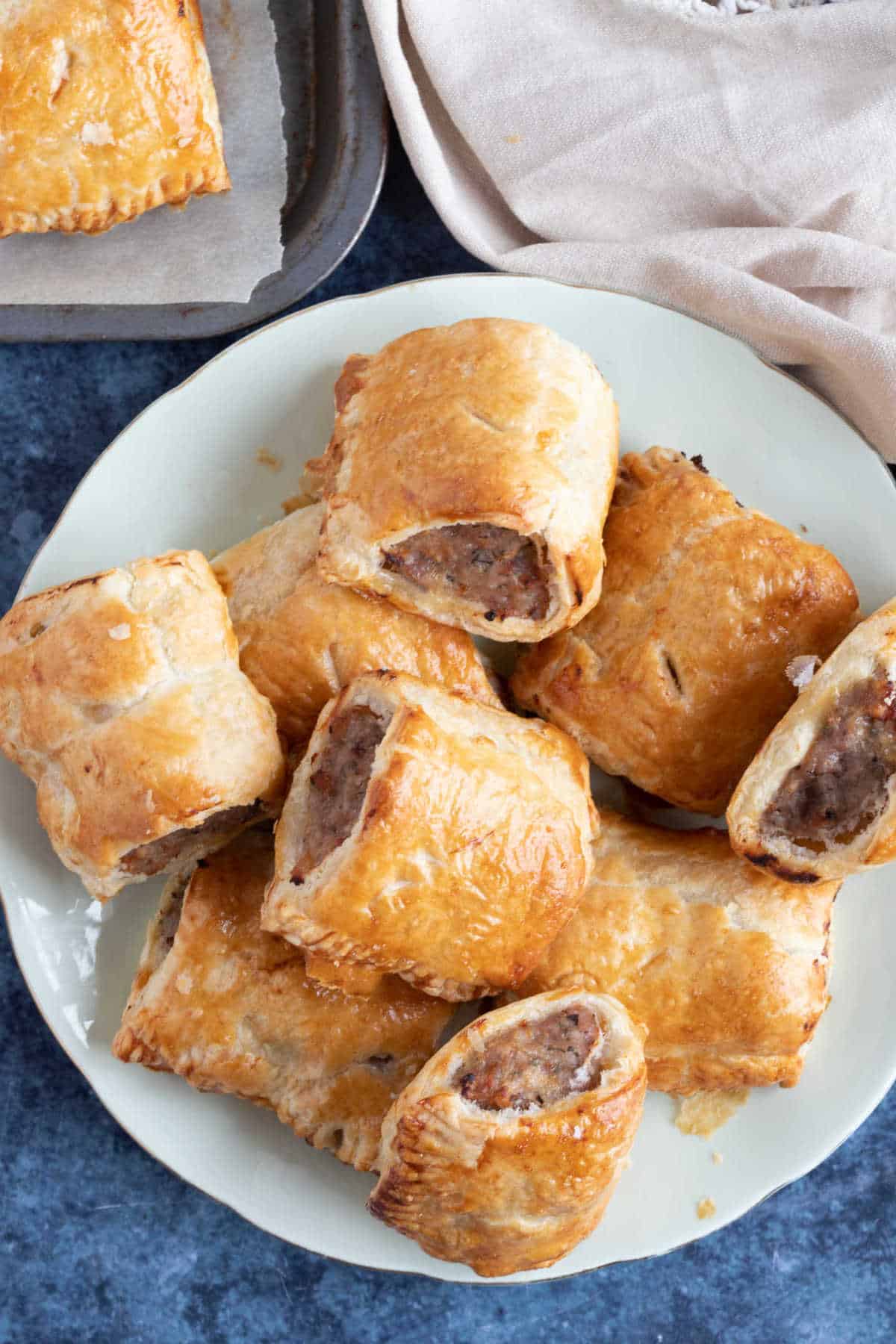 A plate of sausage rolls.