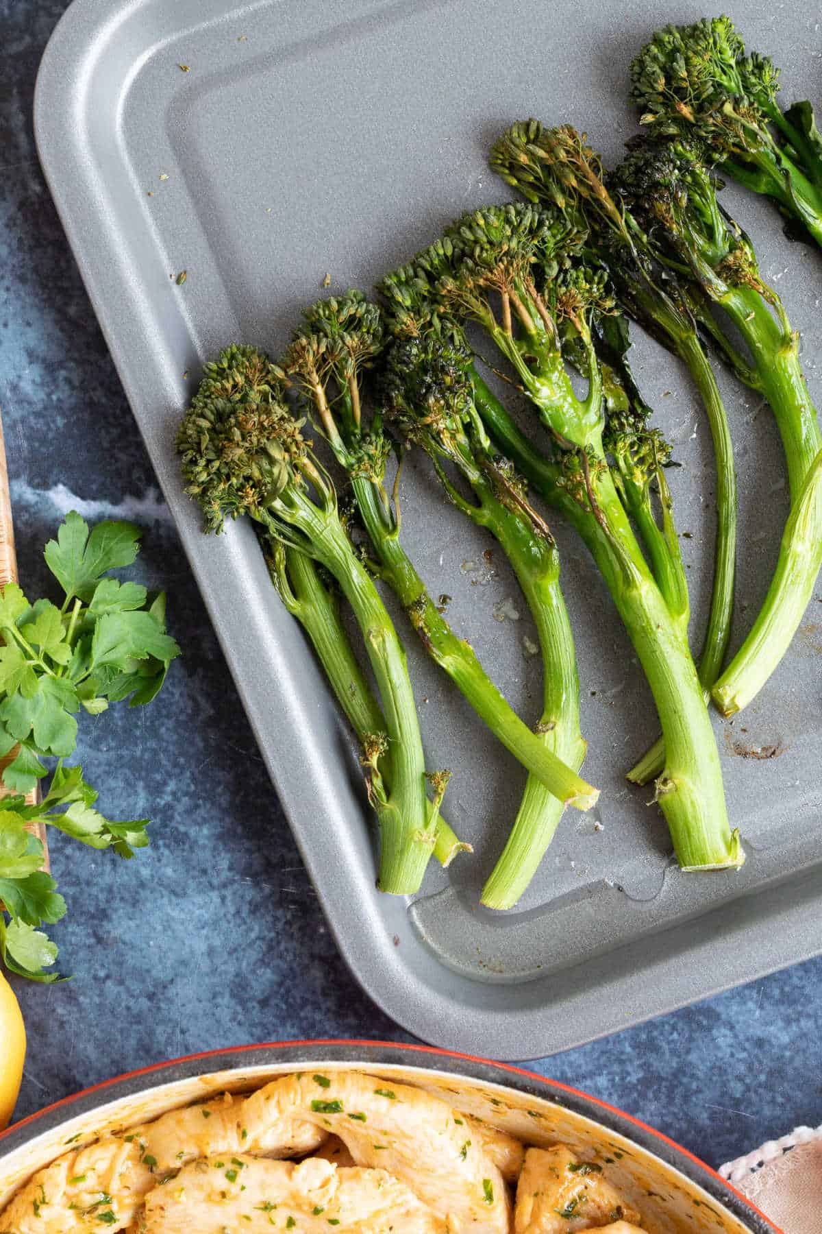 Tenderstem broccoli on a baking sheet.