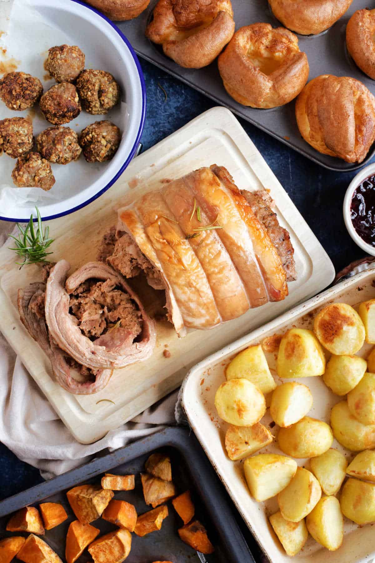 Slow cooker breast of lamb with Yorkshire puddings, potatoes and stuffing.