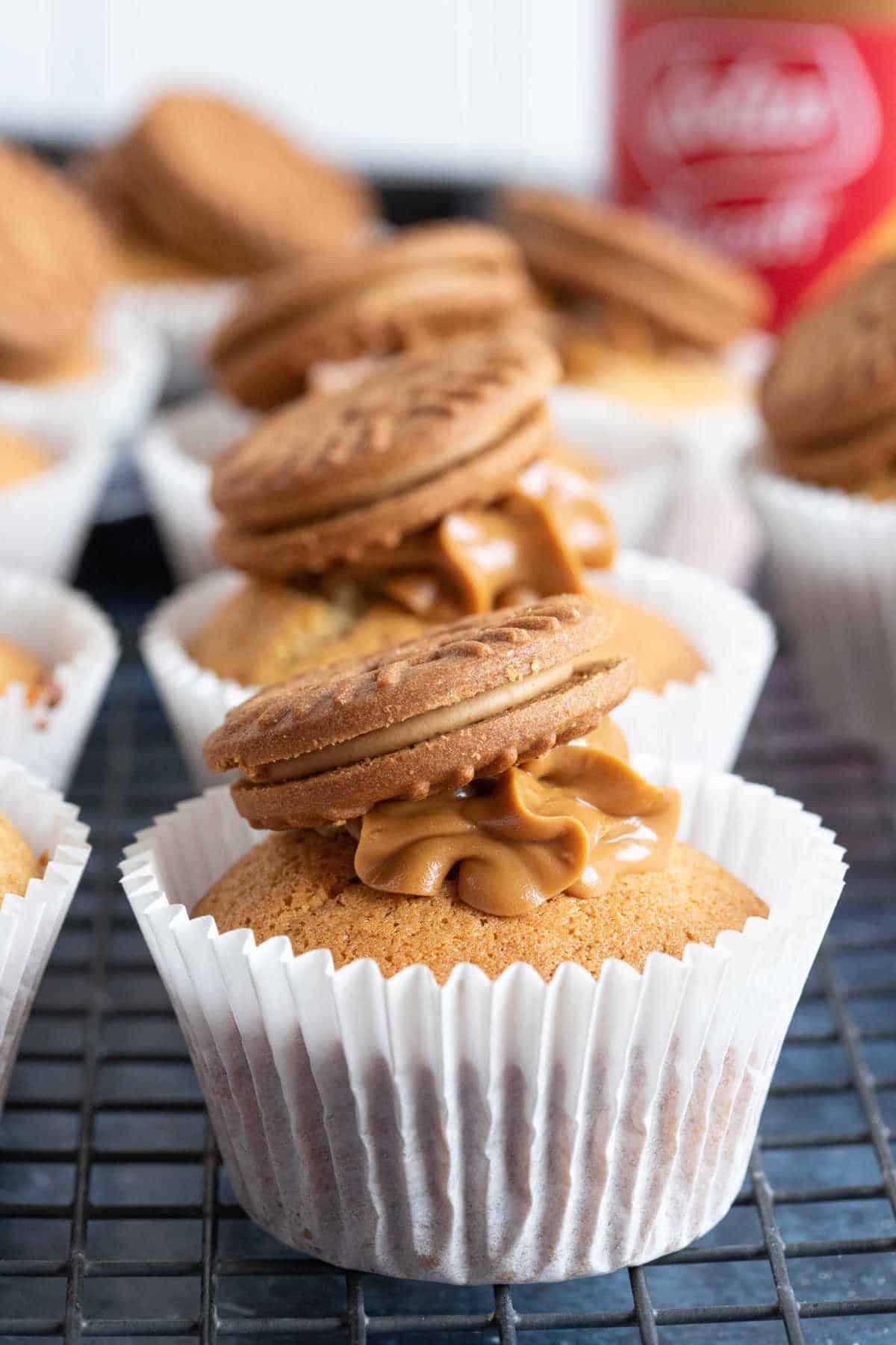 Biscoff muffins on a cooling rack.