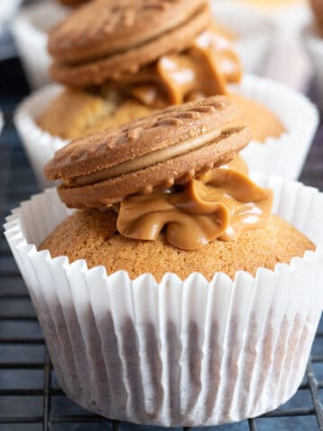 Biscoff muffin on a cooling rack.