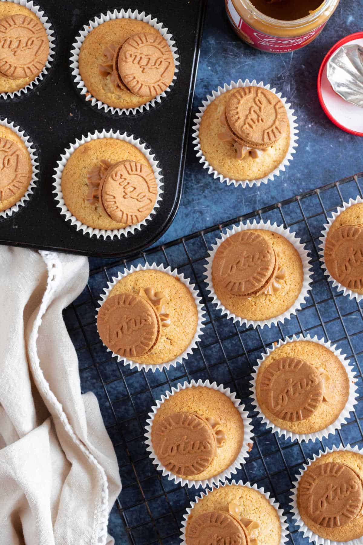 Overhead photo of biscoff muffins on a wire rack.