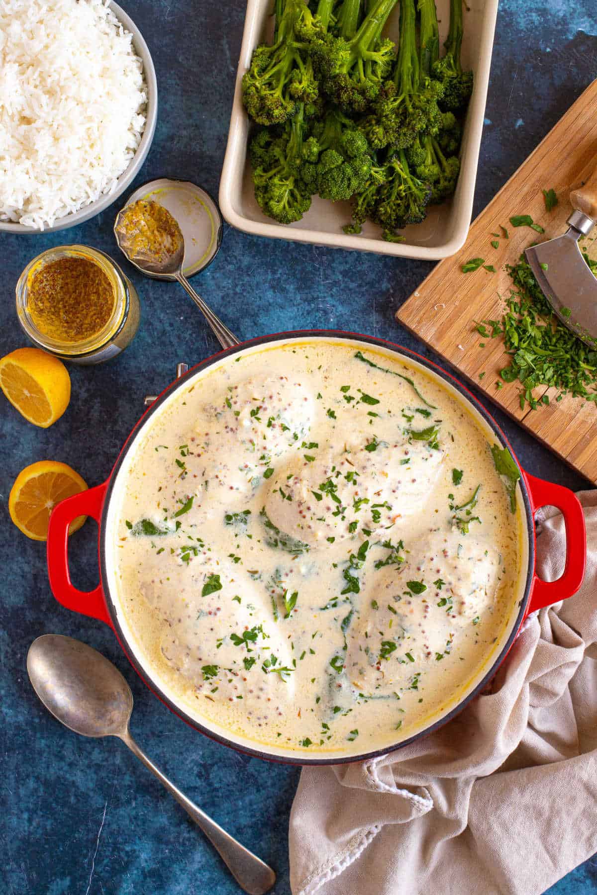 Crème fraiche chicken in a red pan.