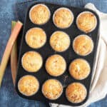 Rhubarb muffins in a baking tin.