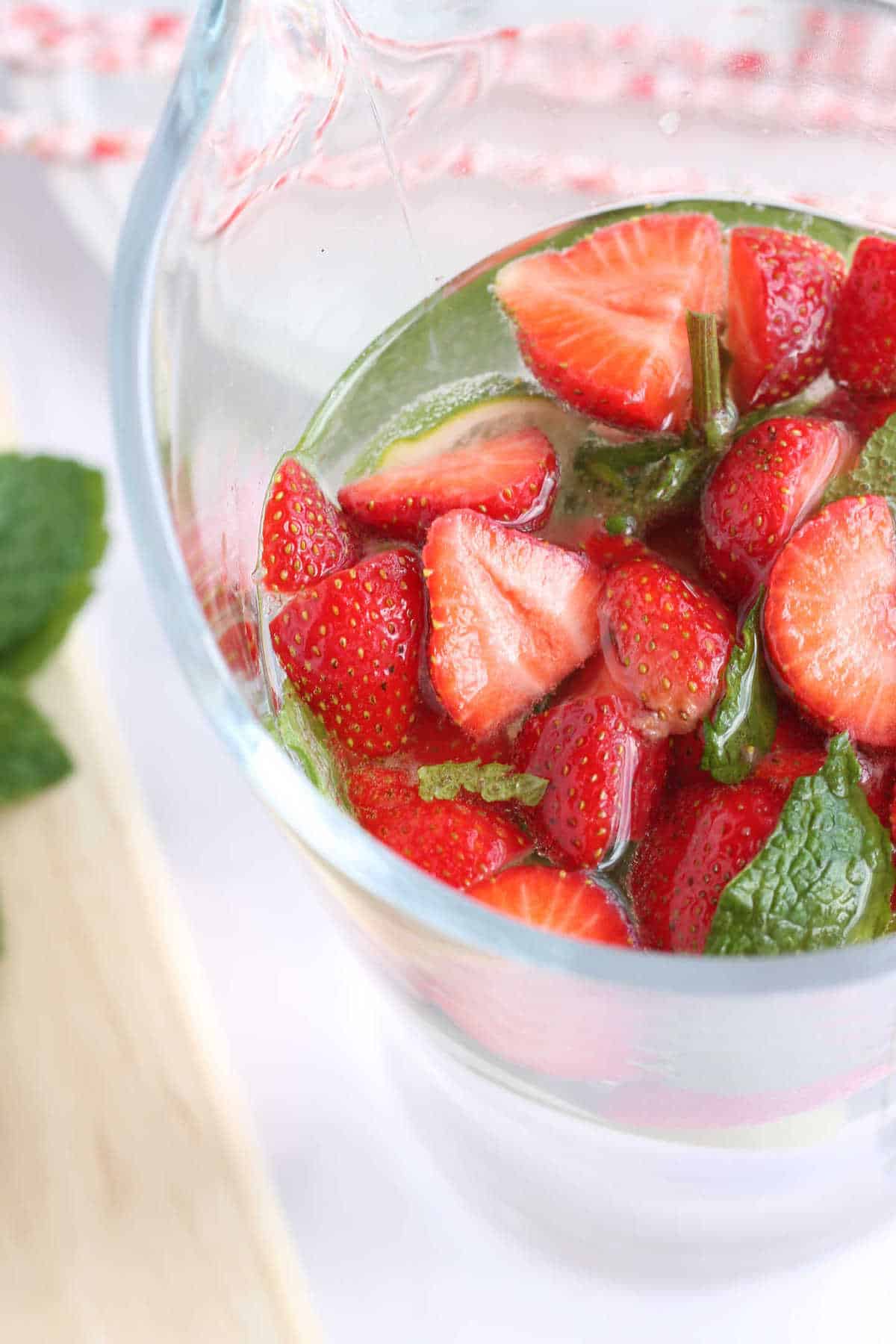 A jug of strawberry mojito.