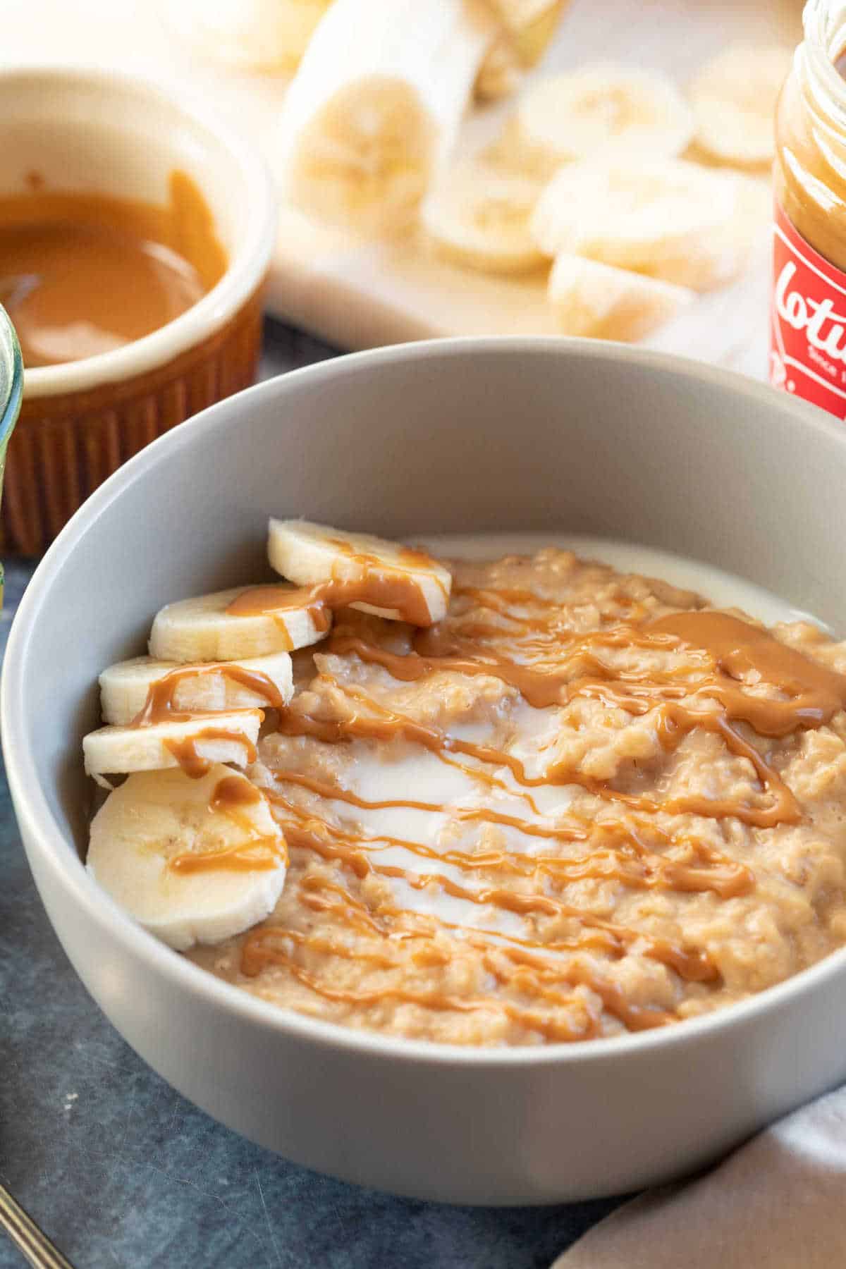 Biscoff porridge in a grey cereal bowl.