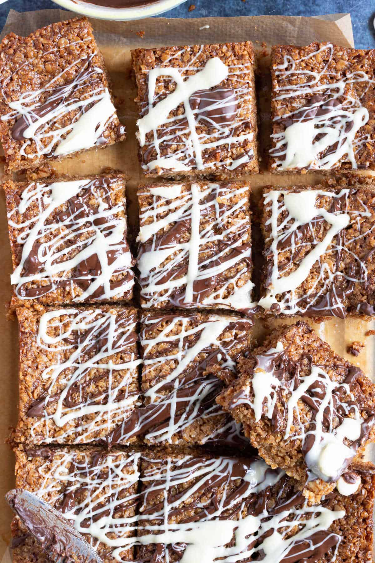 Chocolate chip flapjacks with a melted chocolate drizzle.