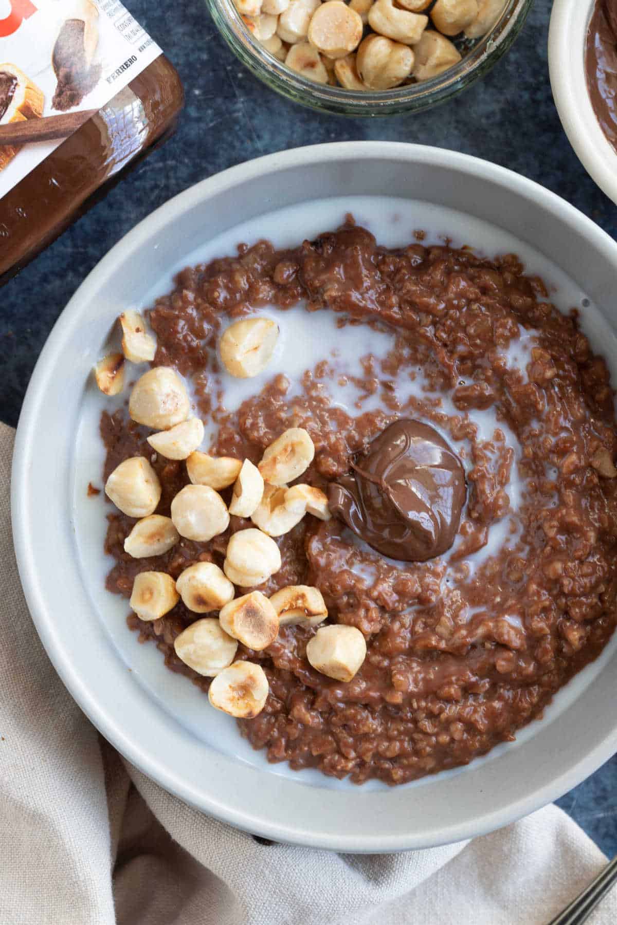 Creamy Nutella porridge with hazelnuts.