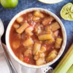 Stewed rhubarb in an orange bowl.