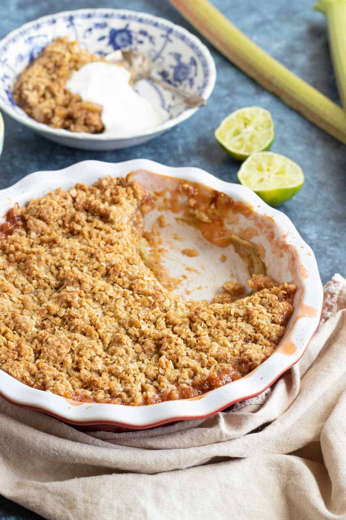 Rhubarb crumble in a red pie dish.