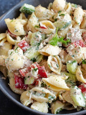 A bowl of creamy tuna pasta salad.