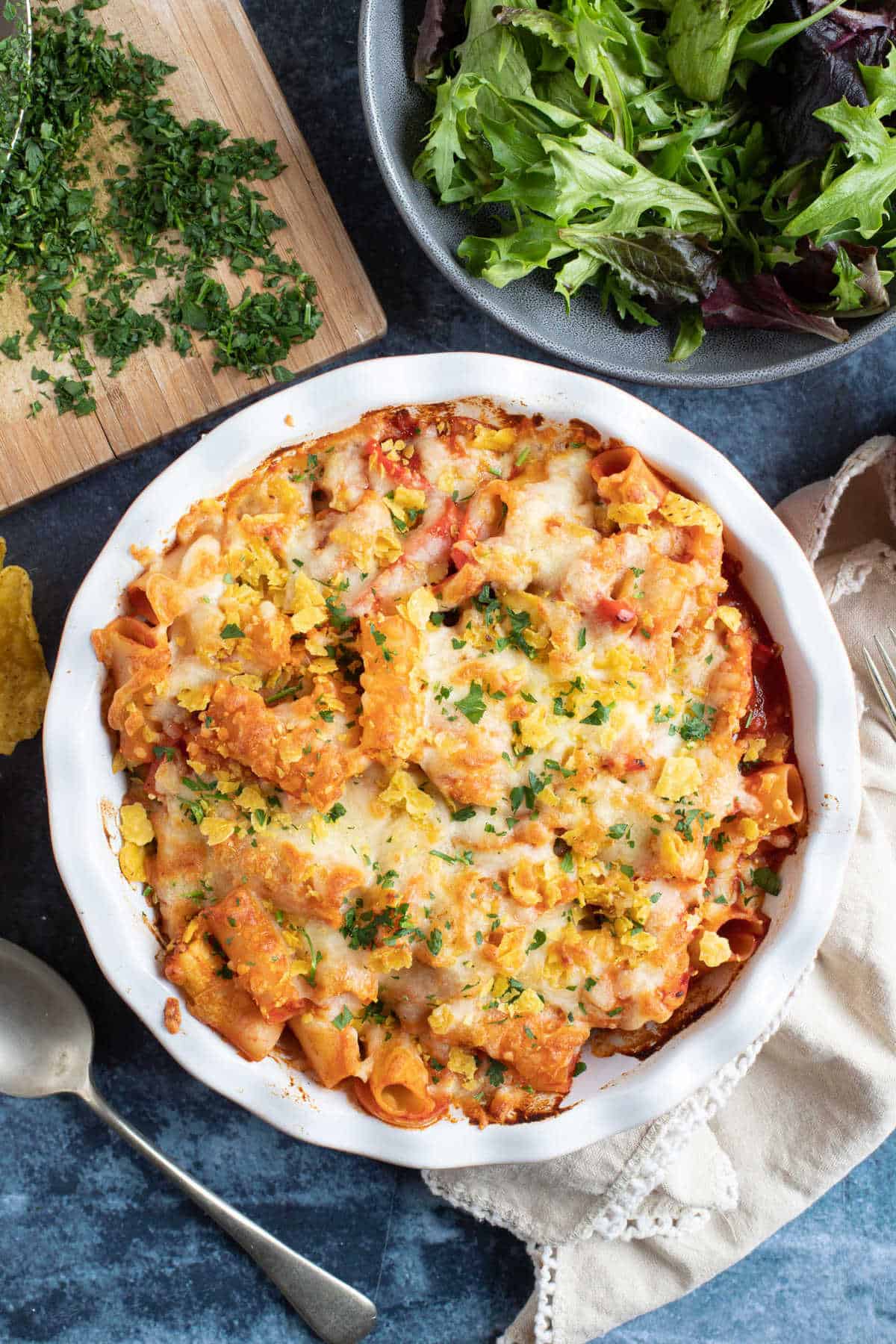 Chicken fajita pasta bake with salad.