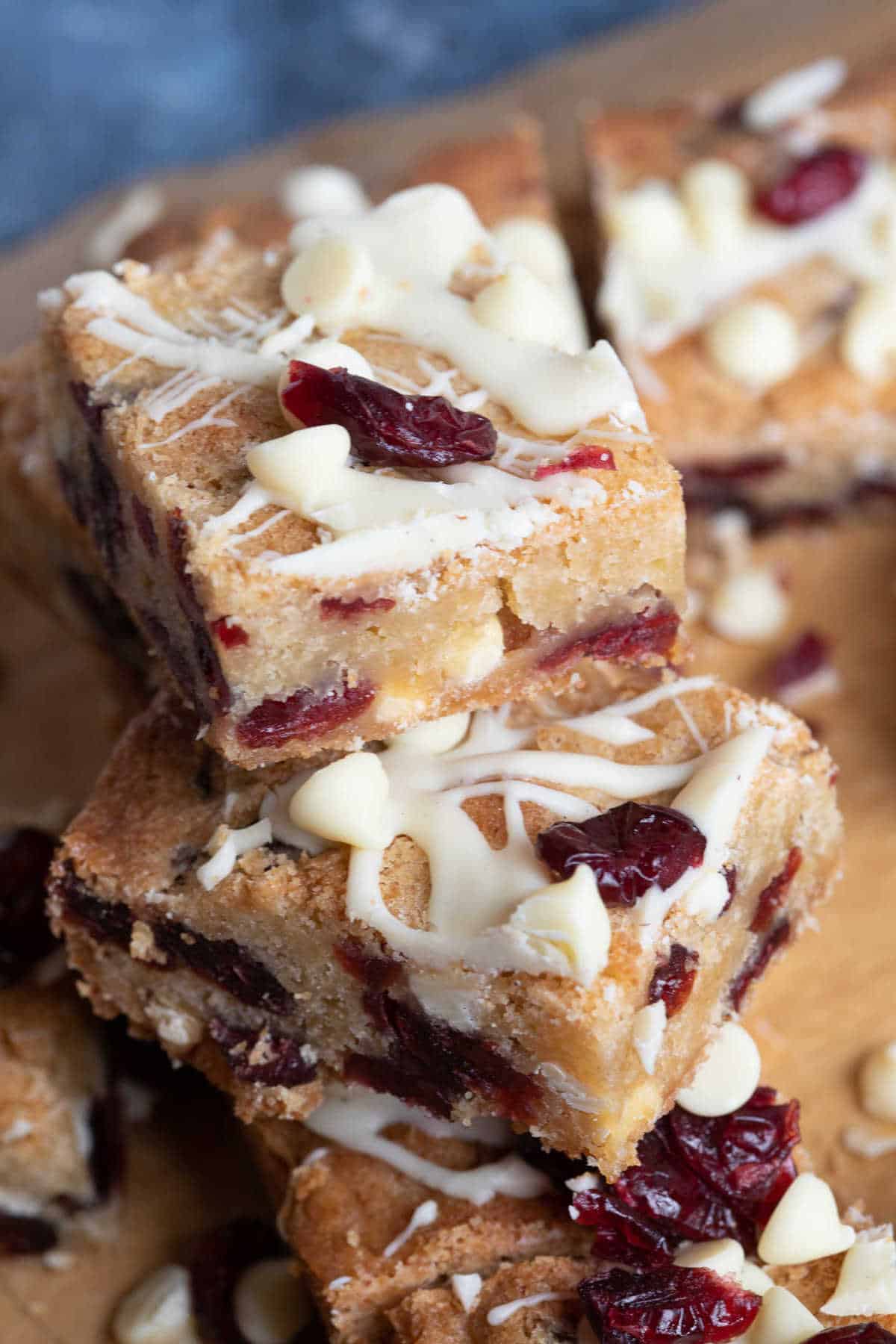 A stack of cranberry and white chocolate blondies.