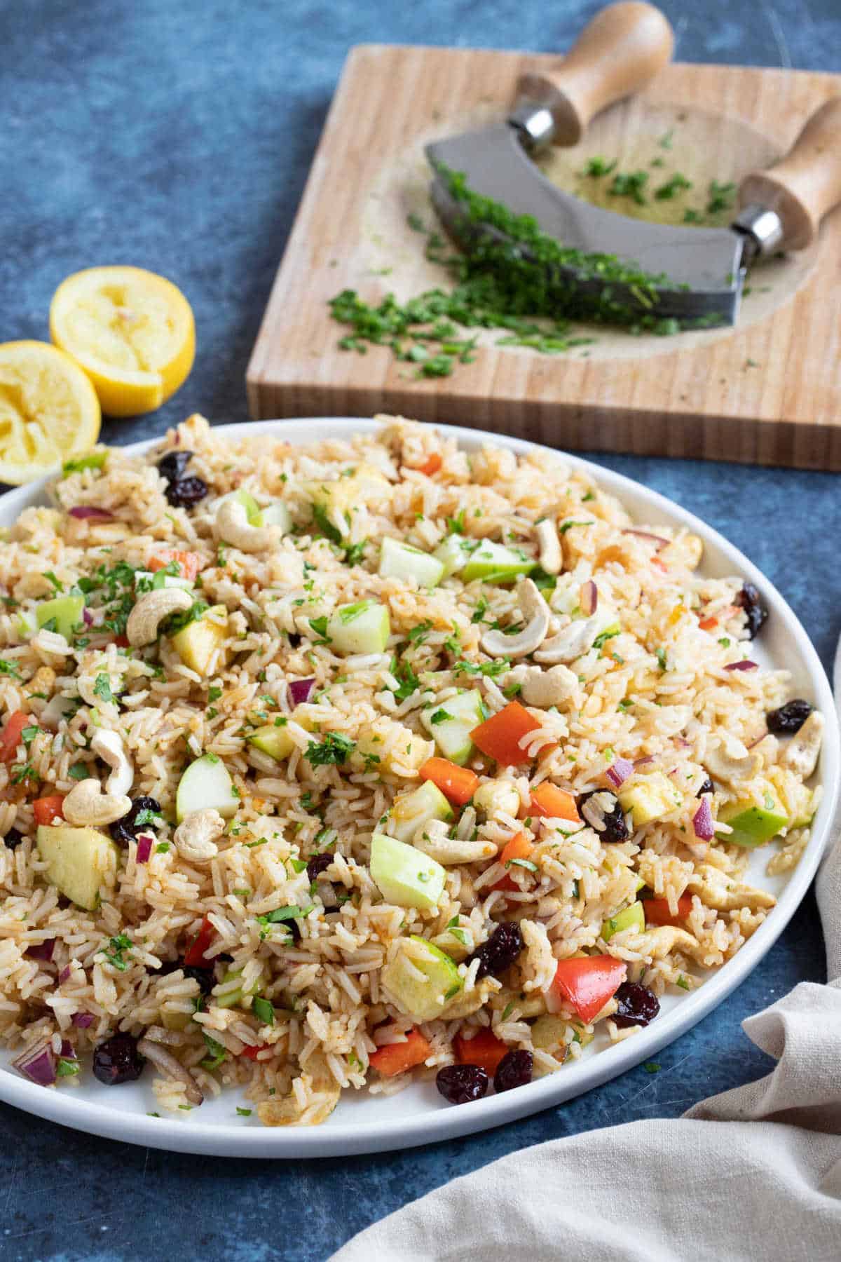 Easy curried rice salad garnished with parsley.