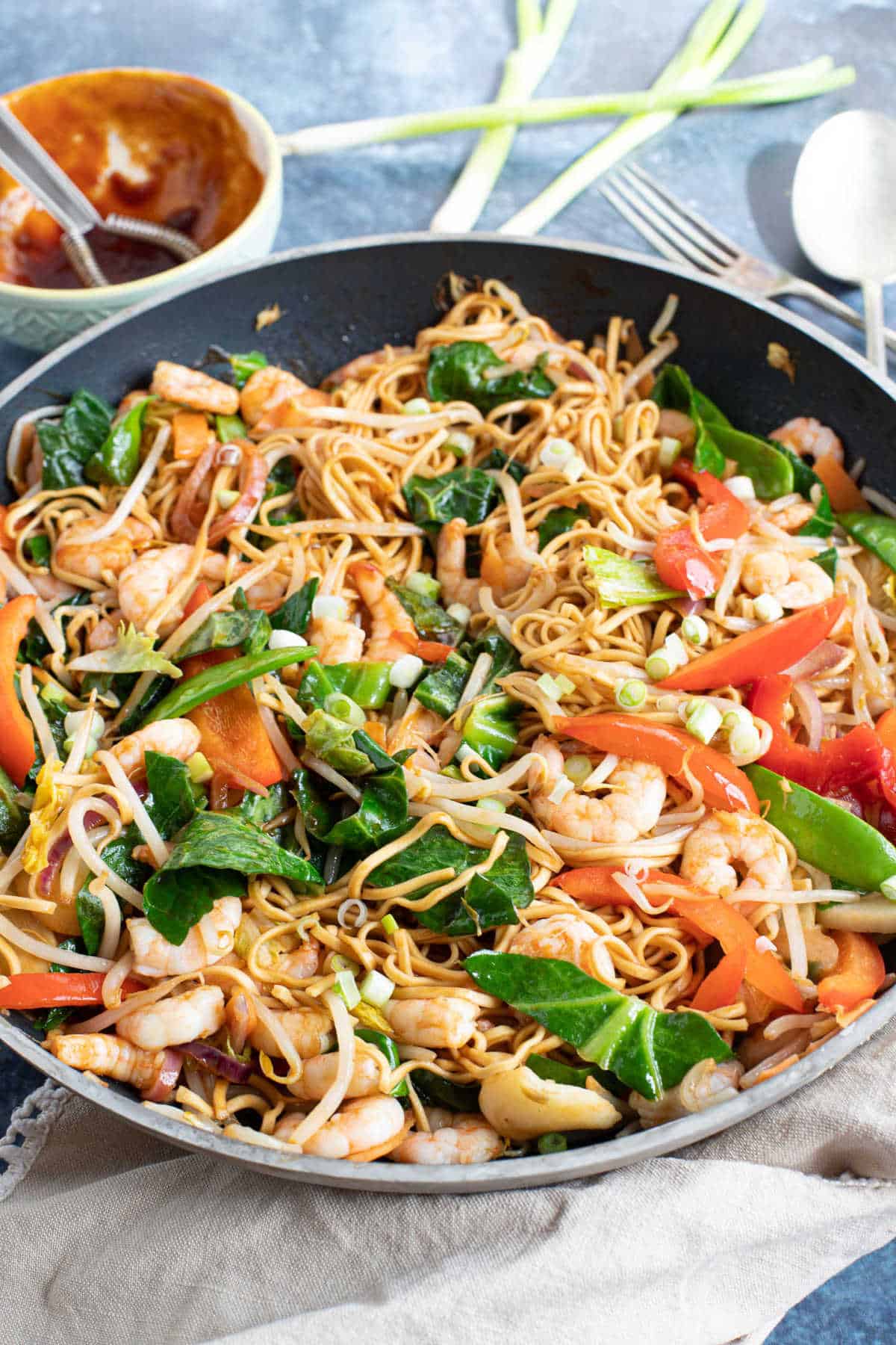 Prawn chow mein in a wok.
